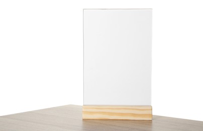 Photo of Menu holder on wooden table against white background. Mockup for design