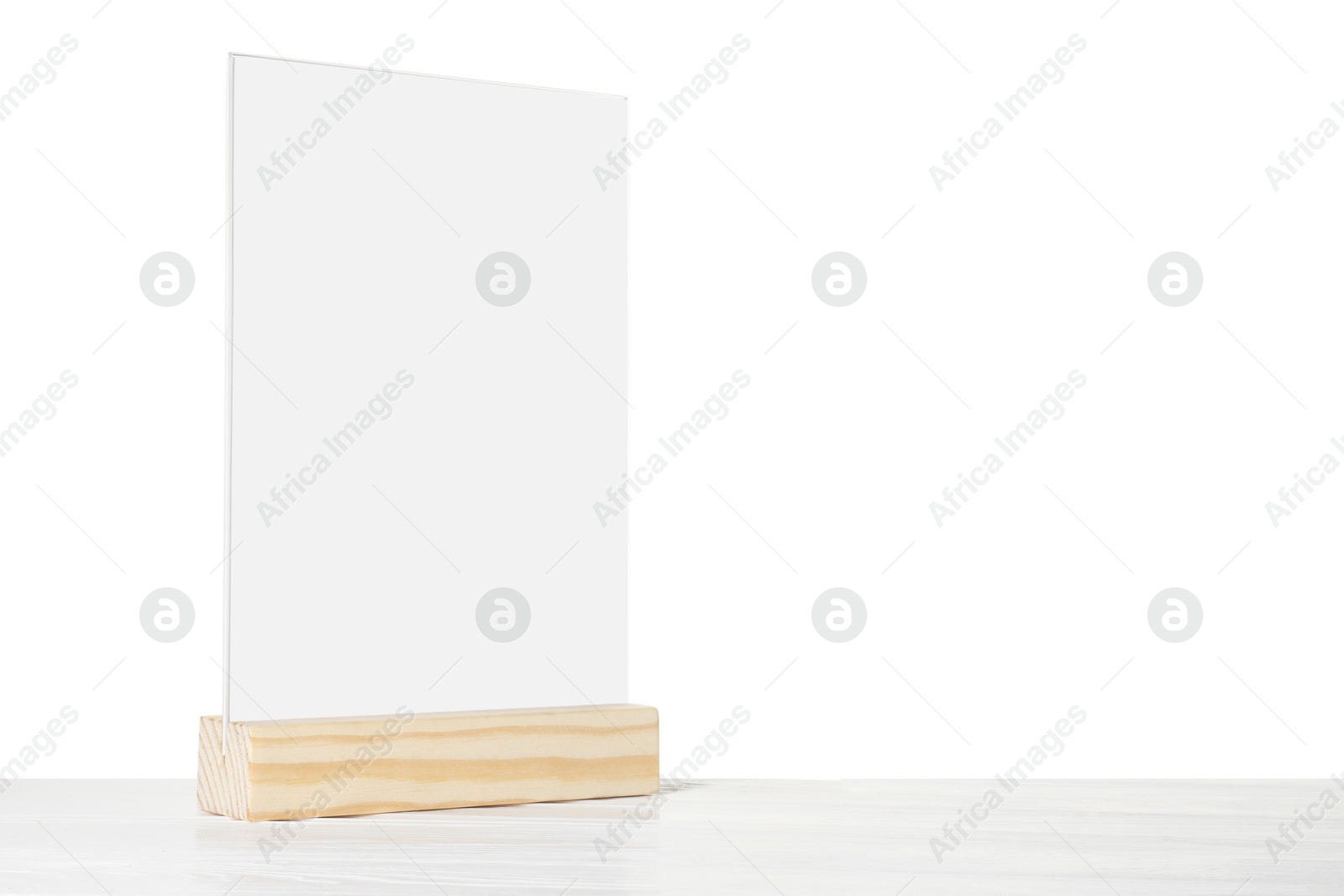 Photo of Menu holder on wooden table against white background. Space for text