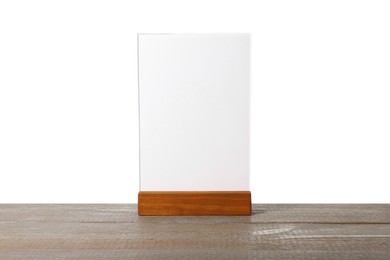 Photo of Menu holder on wooden table against white background. Mockup for design