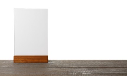 Photo of Menu holder on wooden table against white background. Mockup for design