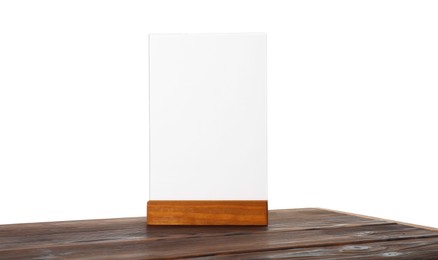 Photo of Menu holder on wooden table against white background. Mockup for design