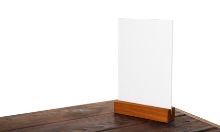 Photo of Menu holder on wooden table against white background. Mockup for design