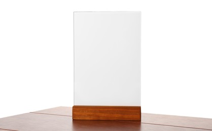 Photo of Menu holder on wooden table against white background. Mockup for design