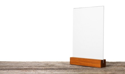 Photo of Menu holder on wooden table against white background. Mockup for design