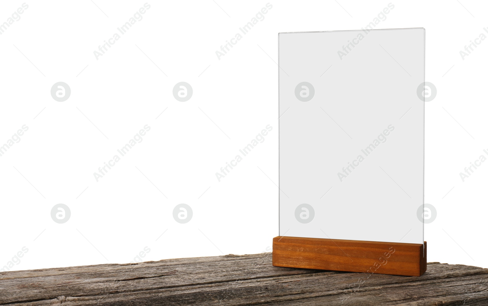 Photo of Menu holder on wooden table against white background. Mockup for design