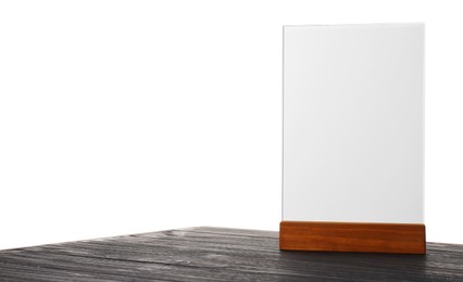 Photo of Menu holder on wooden table against white background. Mockup for design