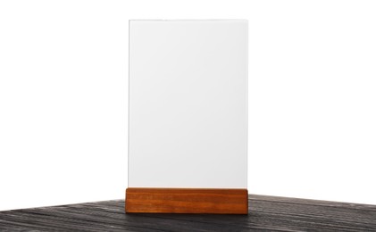 Photo of Menu holder on wooden table against white background. Mockup for design