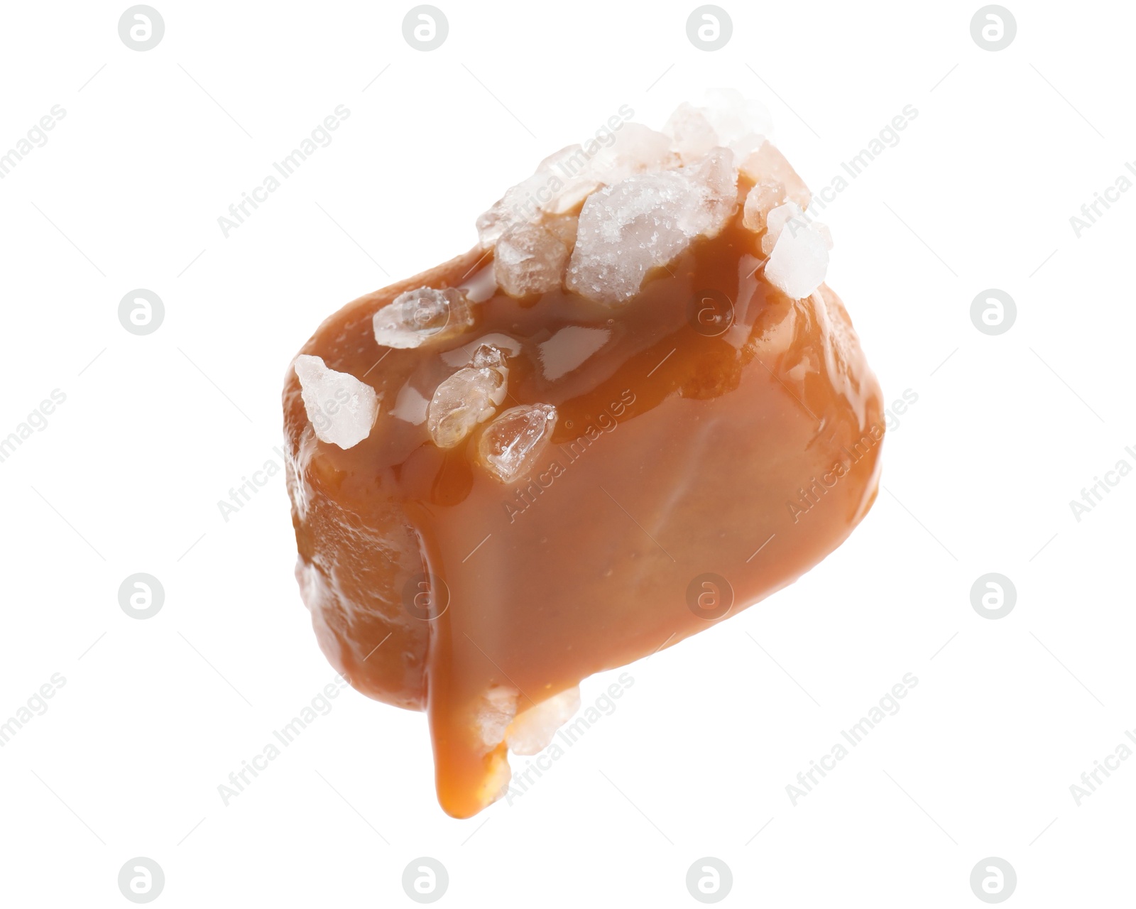 Photo of Yummy candy with salted caramel isolated on white