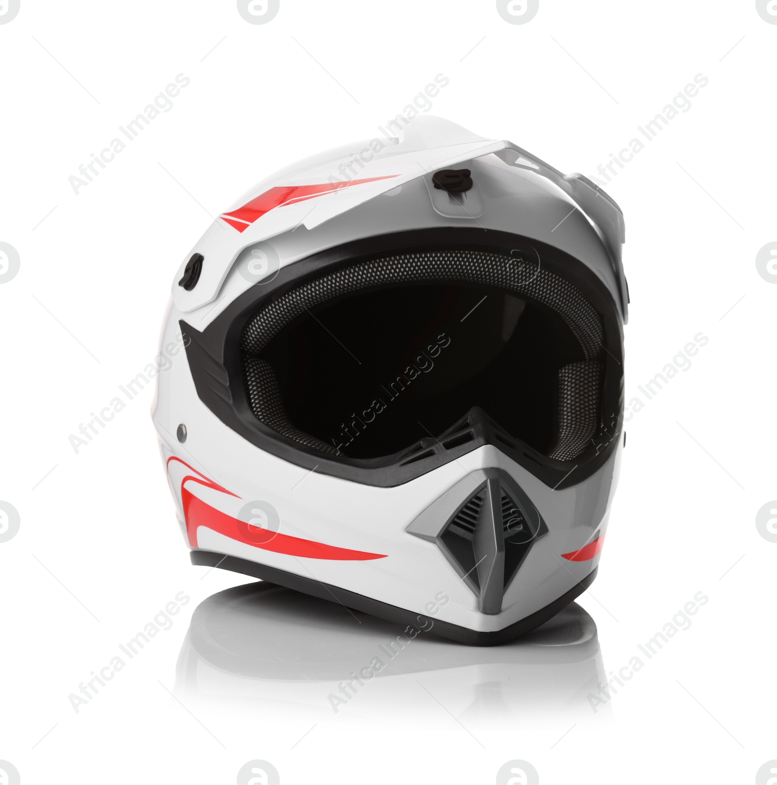 Photo of New stylish motorcycle helmet isolated on white