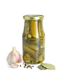 Photo of Pickled cucumbers in jar and spices isolated on white