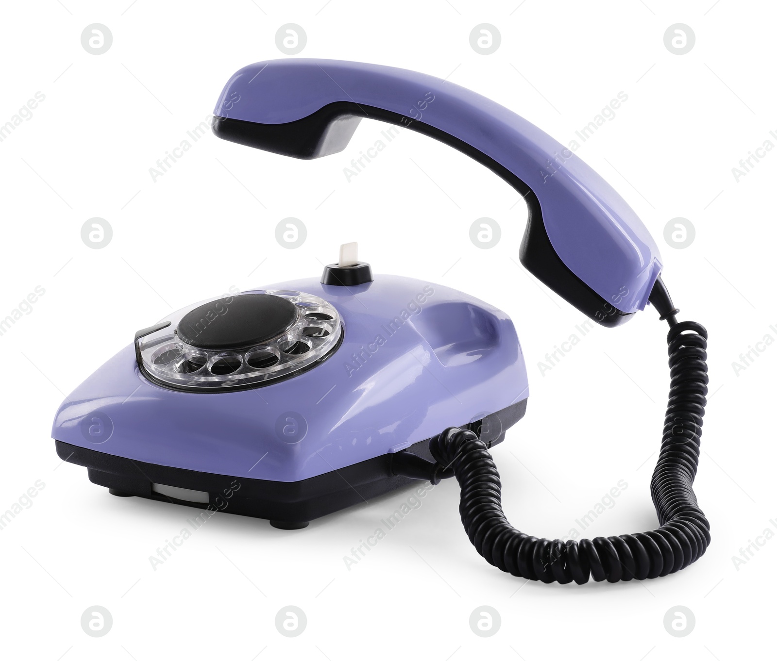 Photo of One violet telephone with handset isolated on white