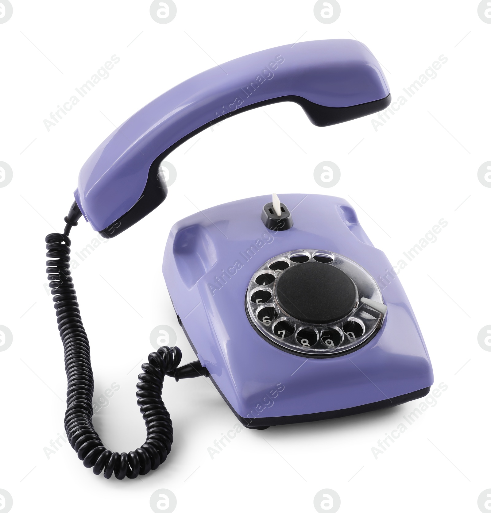 Photo of One violet telephone with handset isolated on white