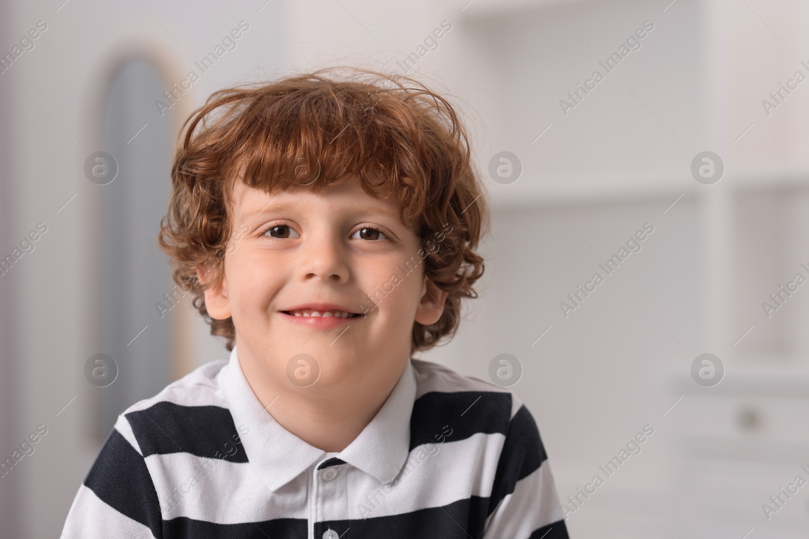 Photo of Portrait of little boy indoors. Cute child