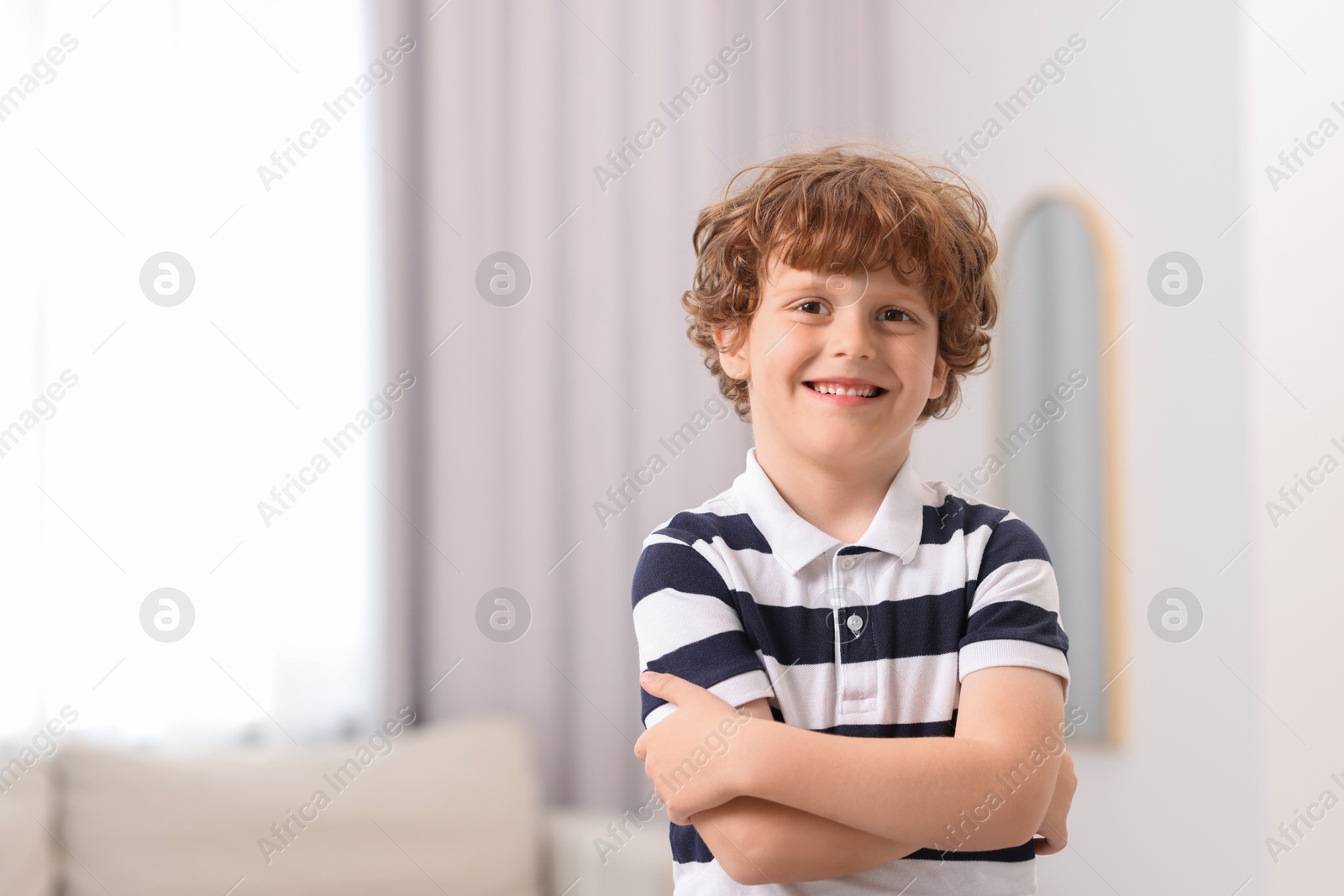 Photo of Portrait of little boy indoors, space for text. Cute child