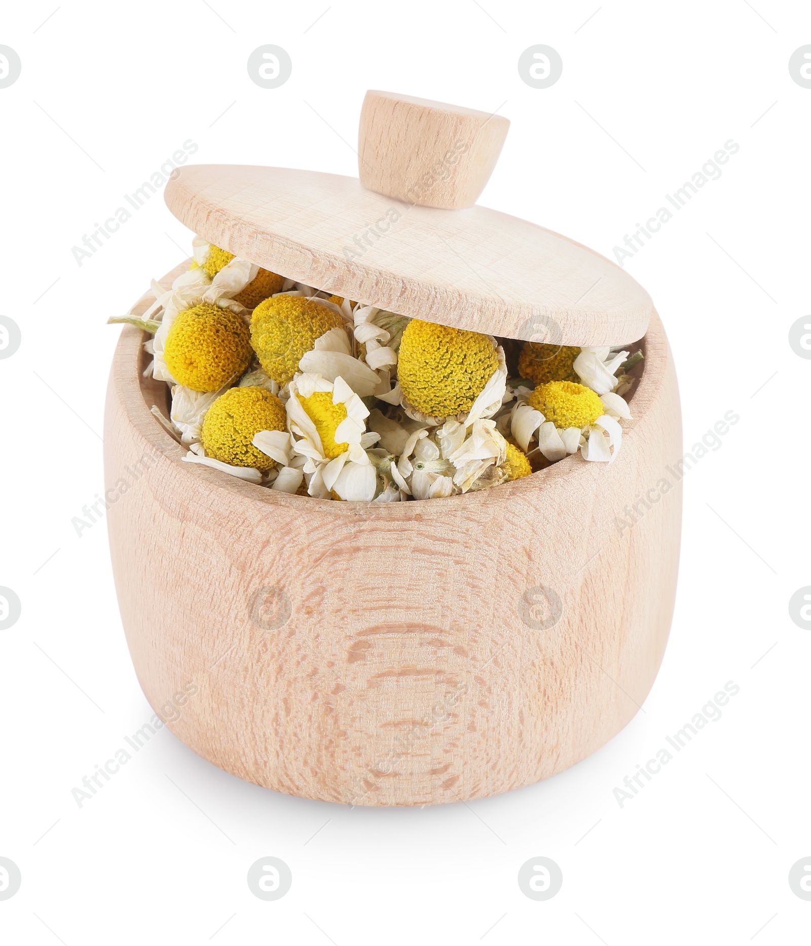 Photo of Chamomile flowers in wooden bowl isolated on white