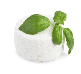 Fresh ricotta (cream cheese) and basil isolated on white