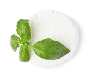 Photo of Fresh ricotta (cream cheese) and basil isolated on white, top view