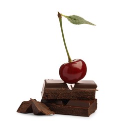 Photo of Fresh cherry with pieces of dark chocolate isolated on white