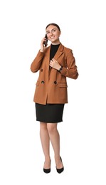 Photo of Beautiful woman in brown jacket and black dress talking on smartphone against white background