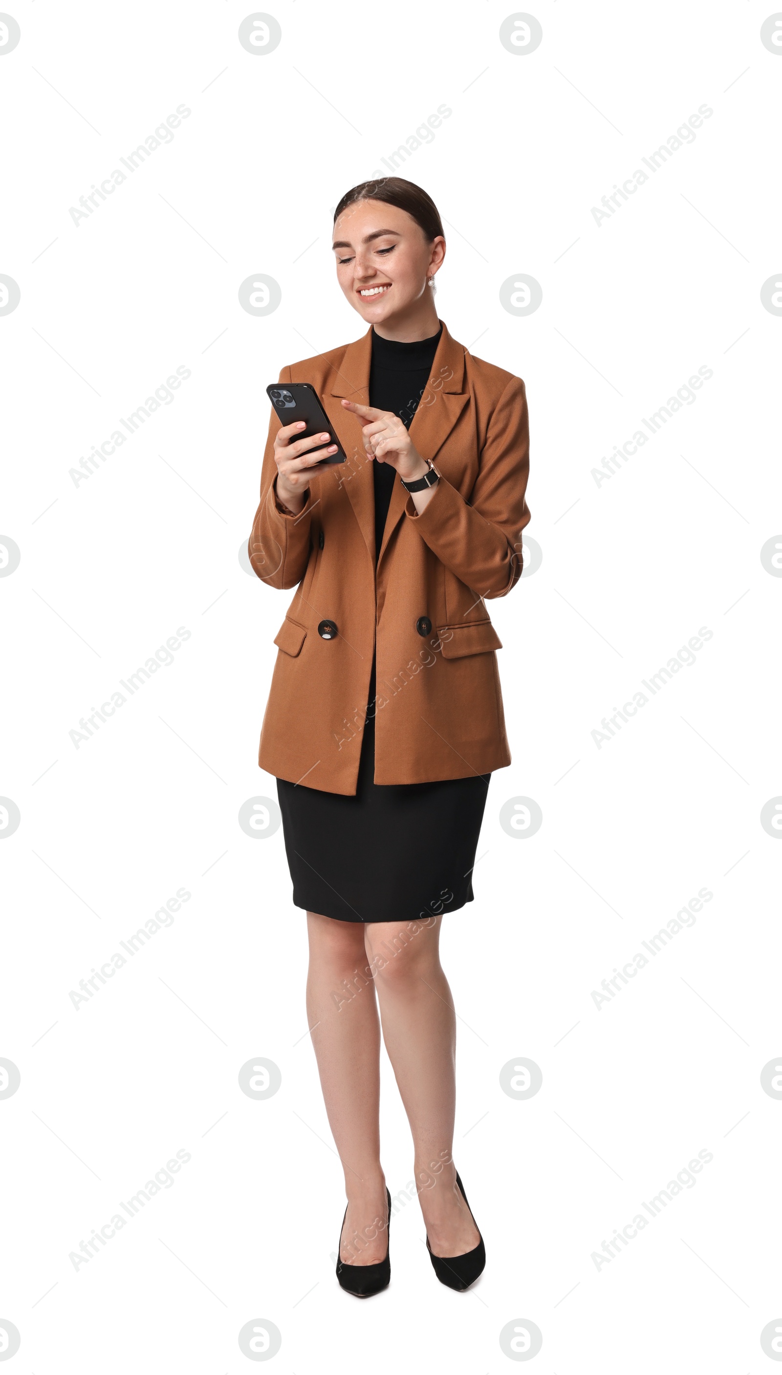 Photo of Beautiful woman in brown jacket using smartphone on white background