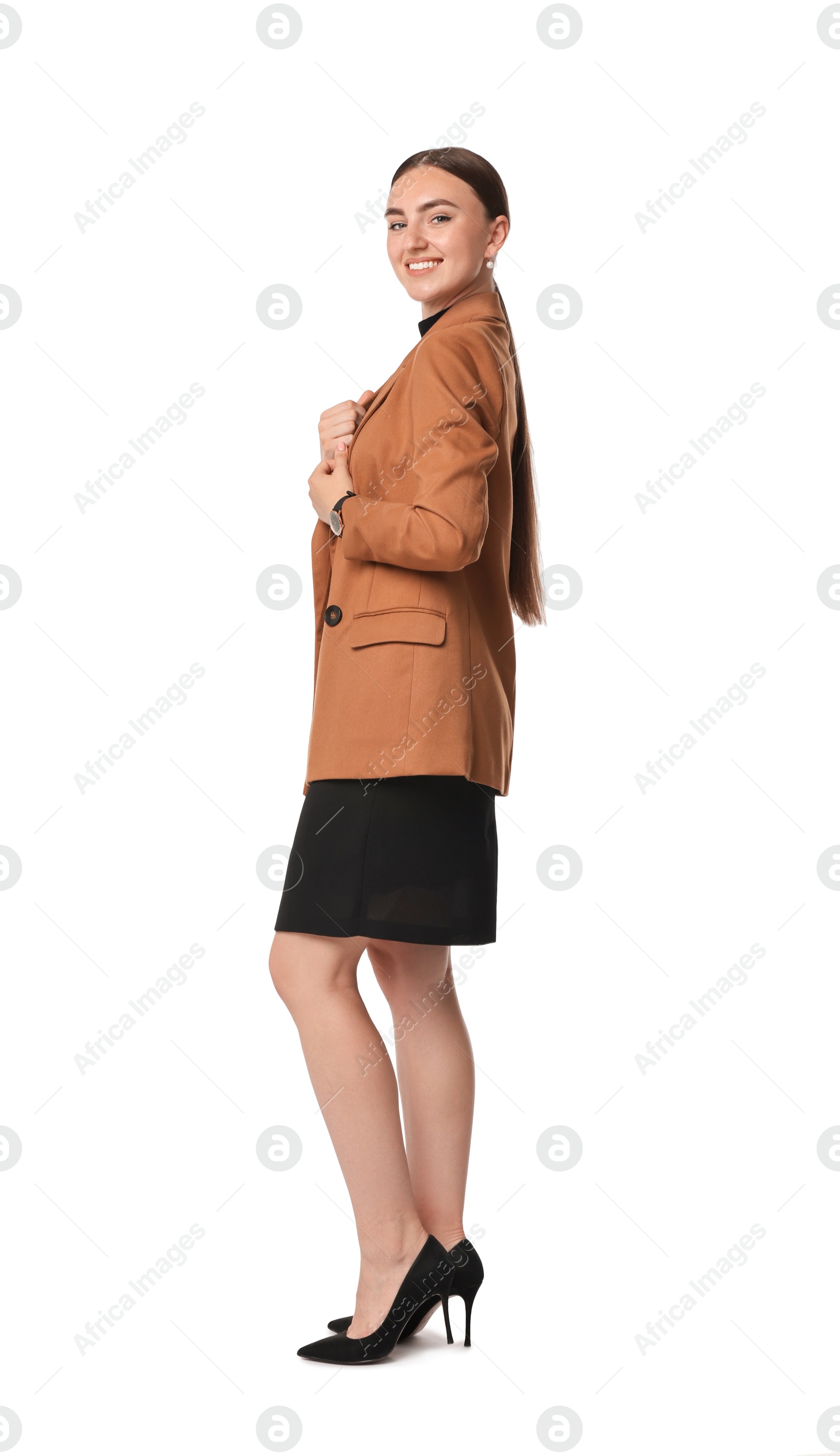 Photo of Beautiful woman in brown jacket and black dress on white background