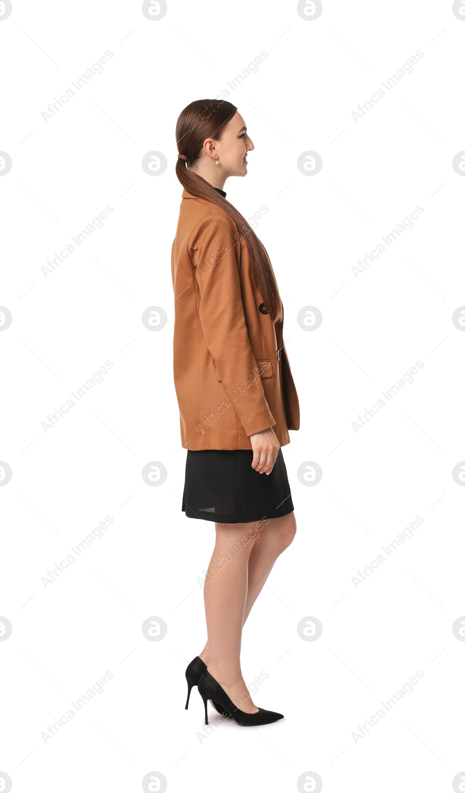 Photo of Beautiful woman in brown jacket and black dress on white background