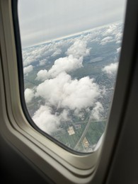 Photo of Picturesque view through plane window during flight