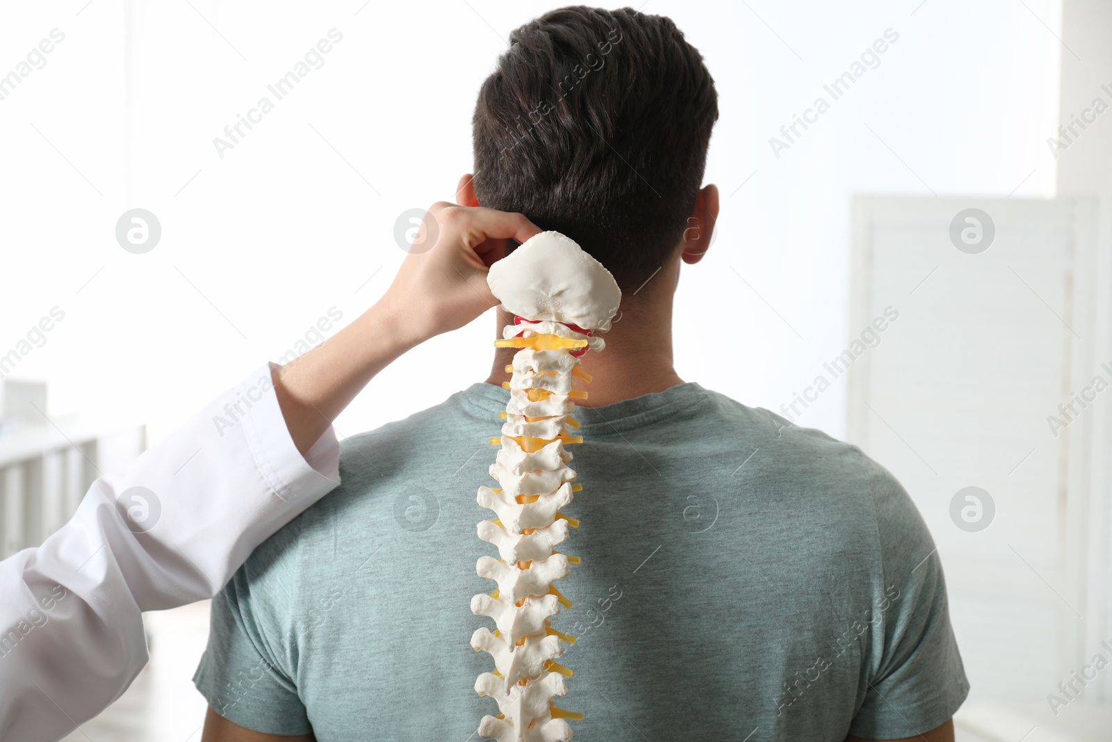 Photo of Man visiting professional orthopedist in medical office