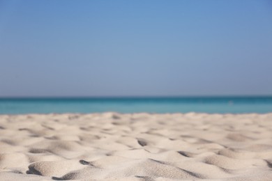 Photo of Beautiful sandy beach and sea on sunny day. Summer vacation