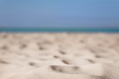 Photo of Beautiful sandy beach and sea on sunny day. Summer vacation