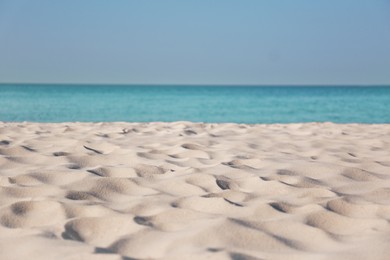 Photo of Beautiful sandy beach and sea on sunny day. Summer vacation