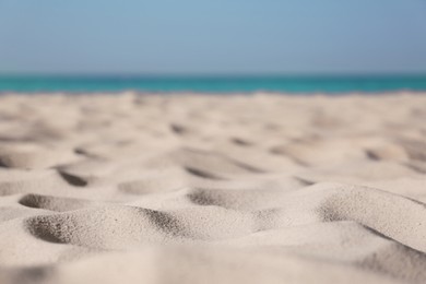 Photo of Beautiful sandy beach and sea on sunny day. Summer vacation