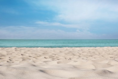 Photo of Beautiful sandy beach and sea on sunny day. Summer vacation