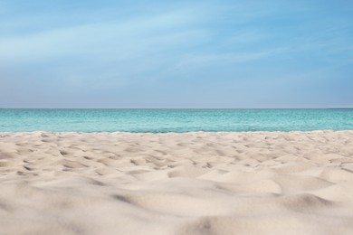 Beautiful sandy beach and sea on sunny day. Summer vacation