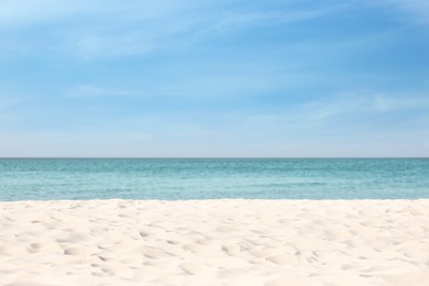 Photo of Beautiful sandy beach and sea on sunny day. Summer vacation