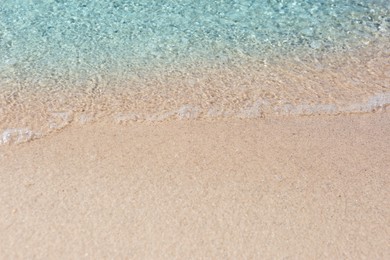 Sea waves rolling on beautiful sandy beach. Summer vacation