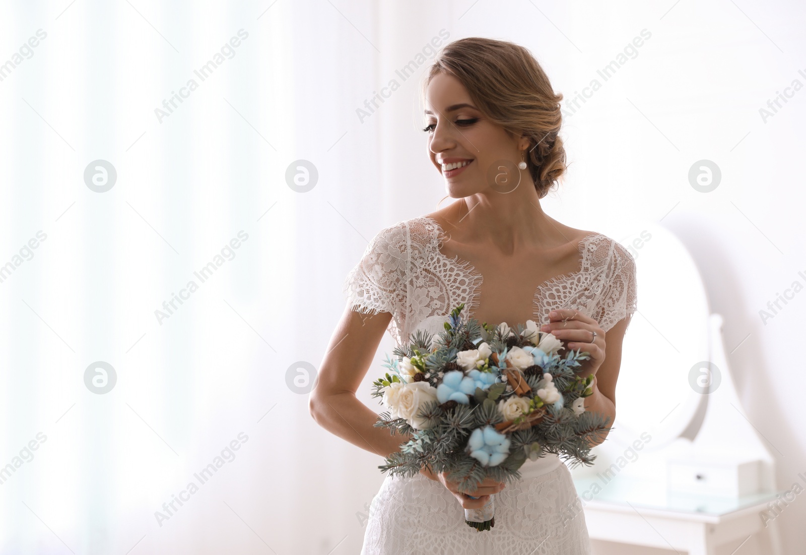 Photo of Beautiful bride with winter wedding bouquet indoors. Space for text