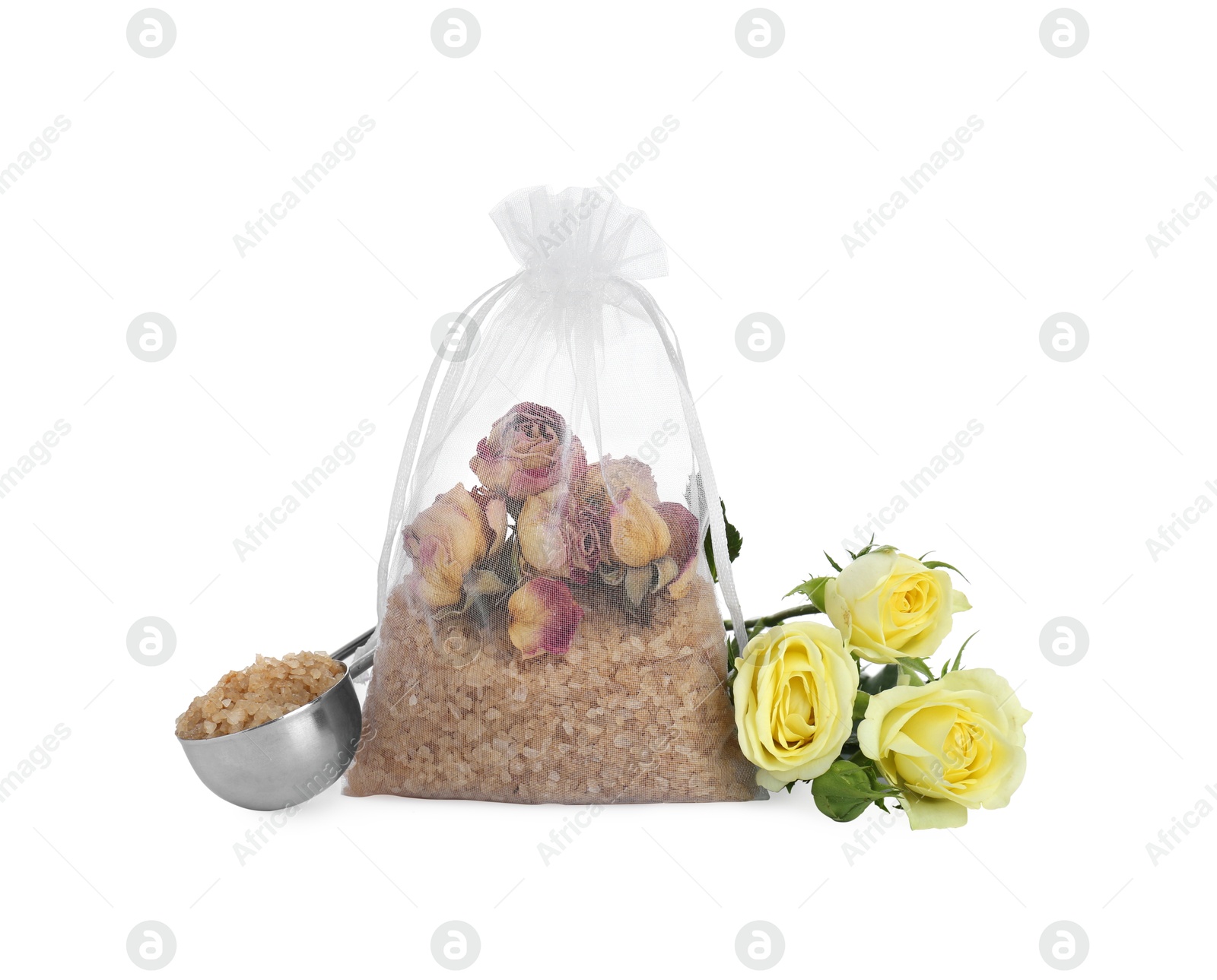 Photo of Scented sachet with dried roses and fresh flowers on white background