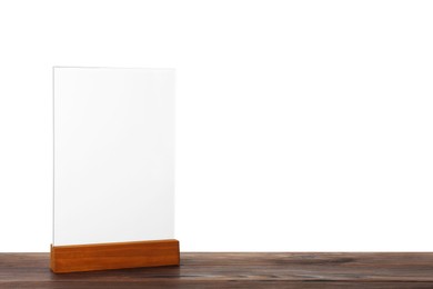 Photo of Menu holder on wooden table against white background. Mockup for design