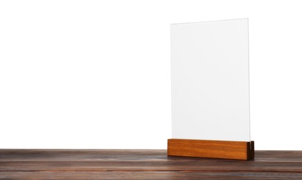 Photo of Menu holder on wooden table against white background. Mockup for design