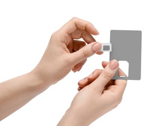 Photo of Woman removing SIM card from holder on white background, closeup