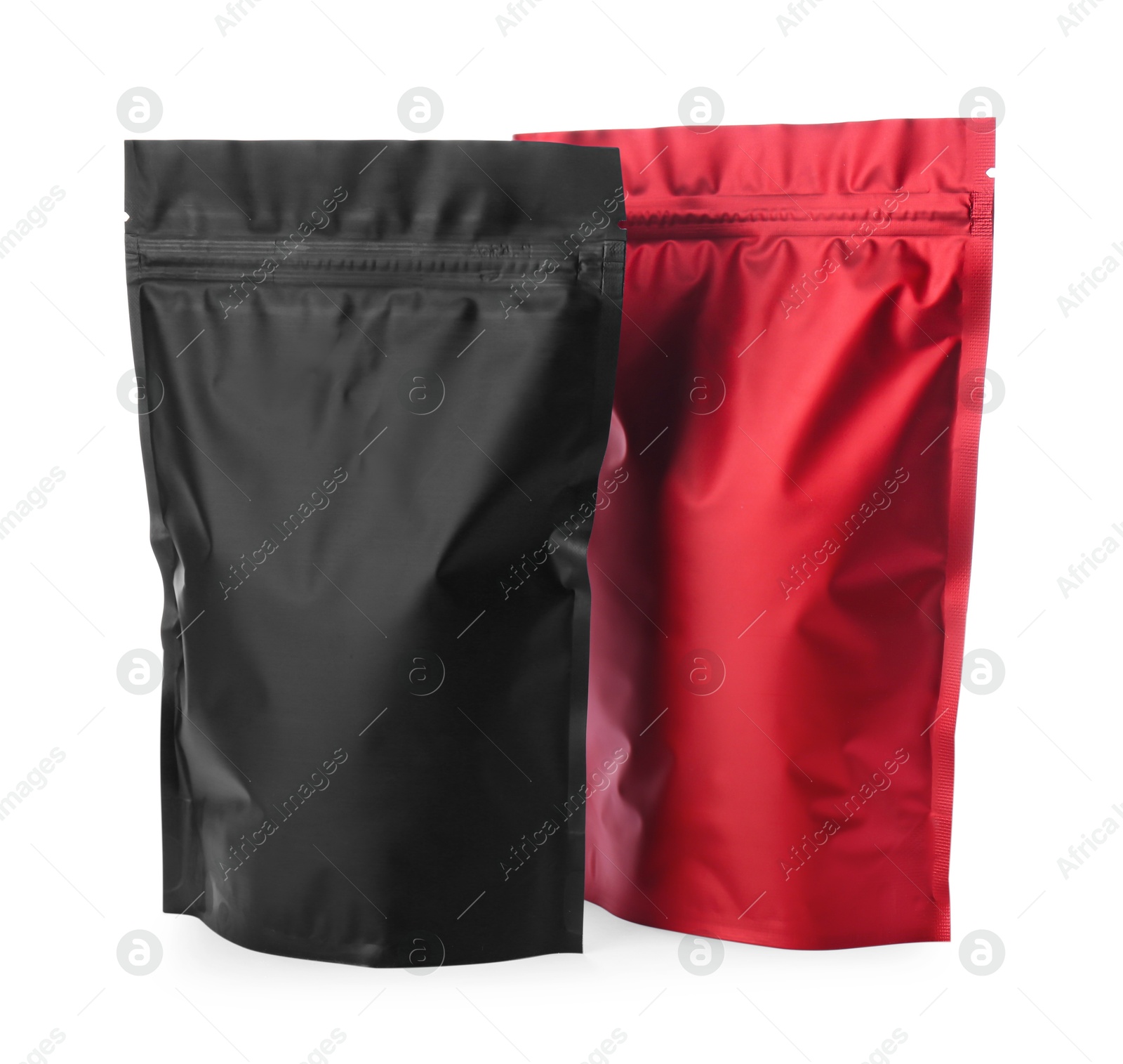 Photo of Black and red resealable foil packages isolated on white