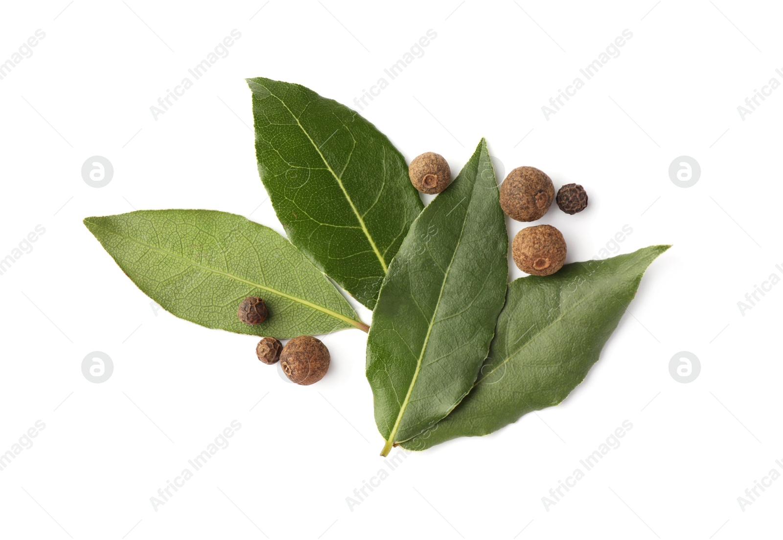 Photo of Fresh green bay leaves and peppercorns on white background, top view