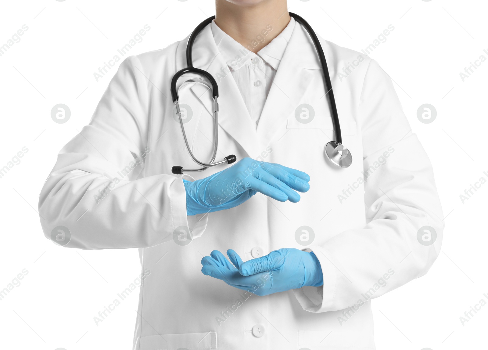 Photo of Doctor holding something on white background, closeup