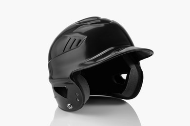 Photo of One black baseball helmet on white background