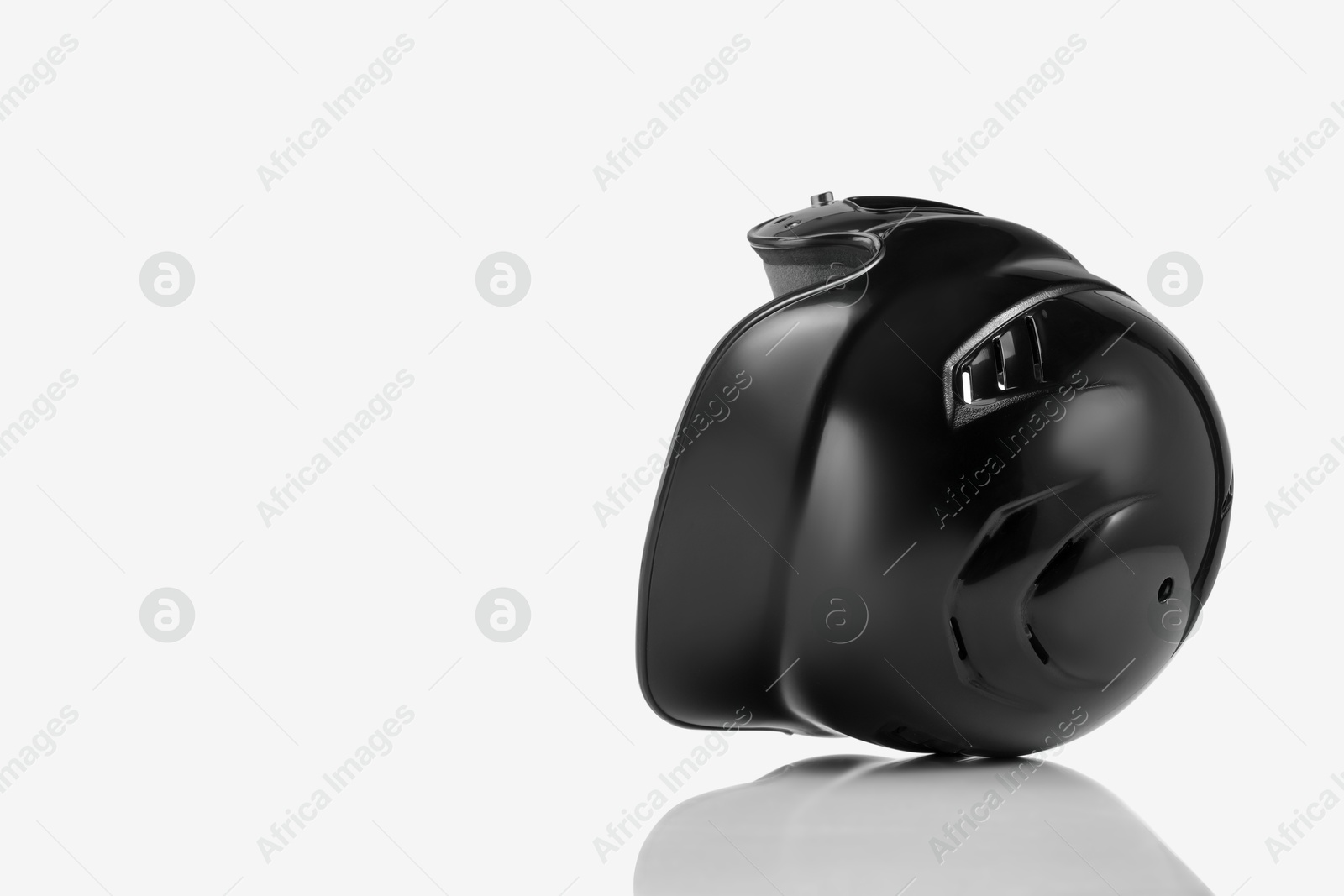 Photo of One black baseball helmet on white background, space for text