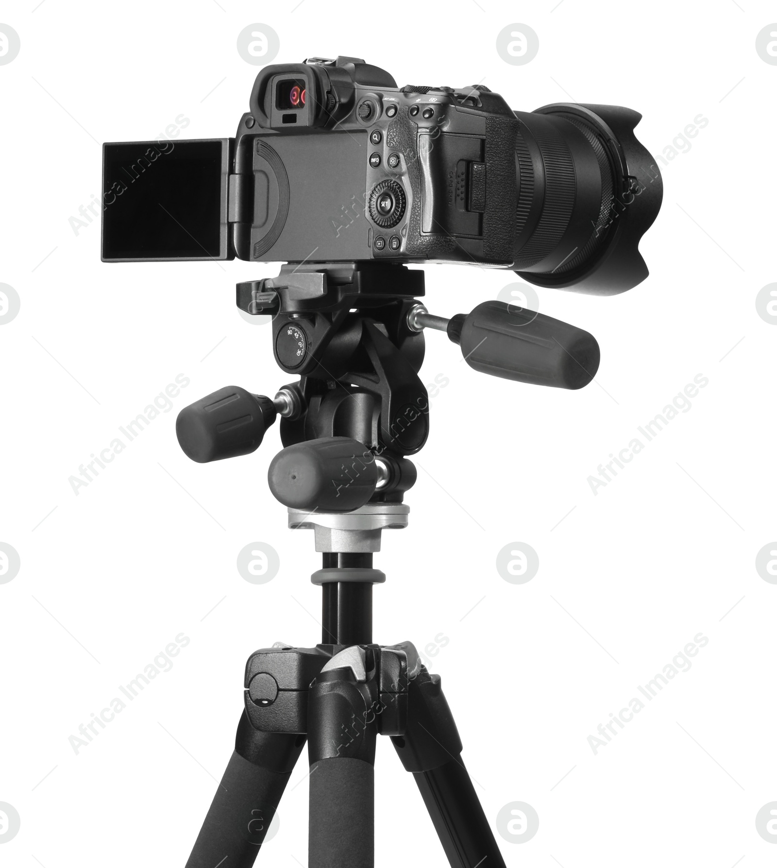 Photo of Modern camera with tripod isolated on white. Photographer's equipment