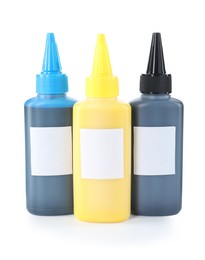 Bottles of different printer ink isolated on white