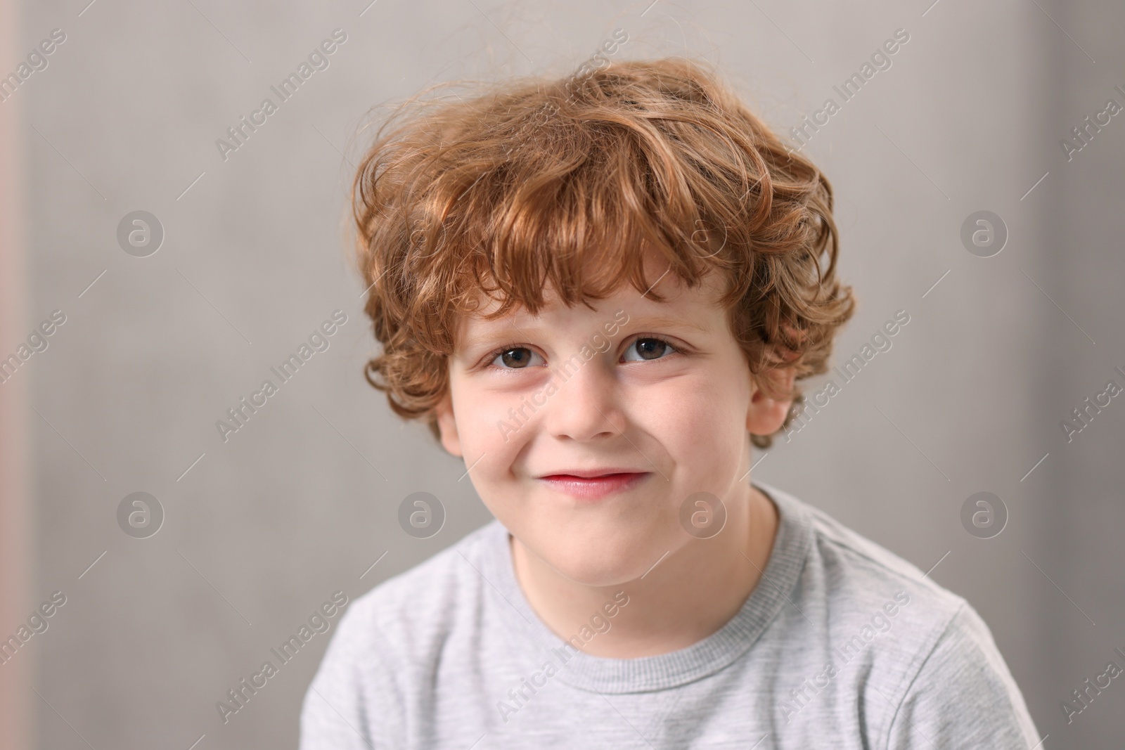 Photo of Portrait of little boy indoors, closeup. Cute child