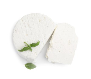 Photo of Fresh ricotta (cream cheese) and basil isolated on white, top view